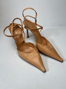 Nude strappy heels